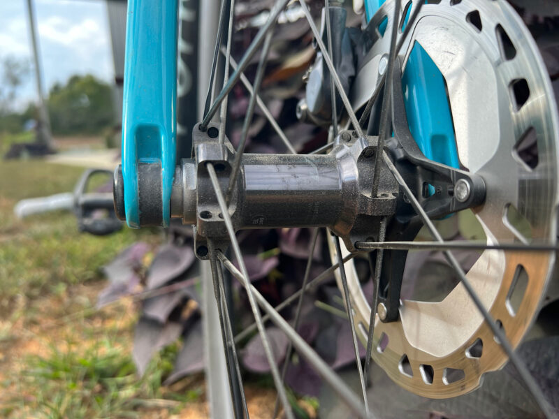 closeup details of shimano ultegra R8100 12-speed road bike wheels